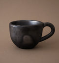 Taza la Negra americano